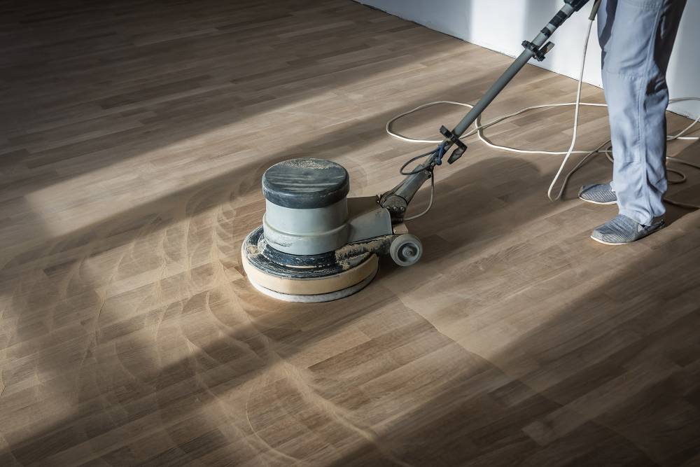 Poncage parquet à Vignols